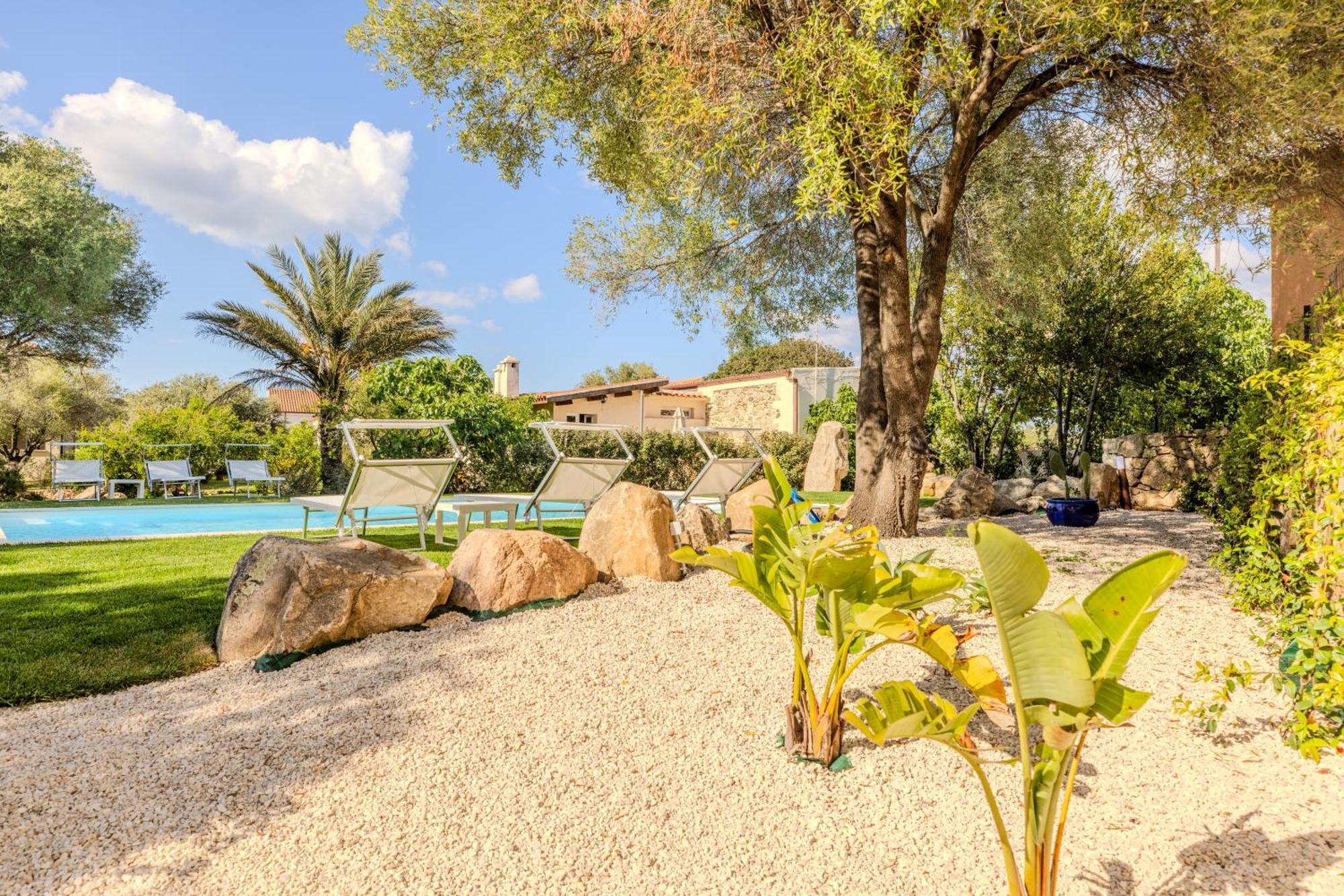 Апартаменты Stazzo San Teodoro Il Ginepro Piscina Condivisa Экстерьер фото